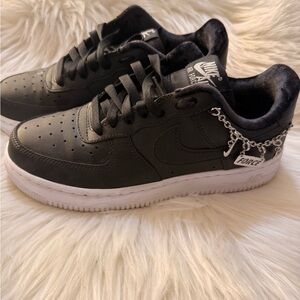 Nike Black Sneakers with Chain Accent
